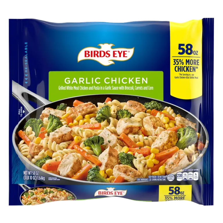 Garlic Chicken Grilled White Meat Chicken and Pasta in a Garlic Sauce with Broccoli, Carrots and Corn