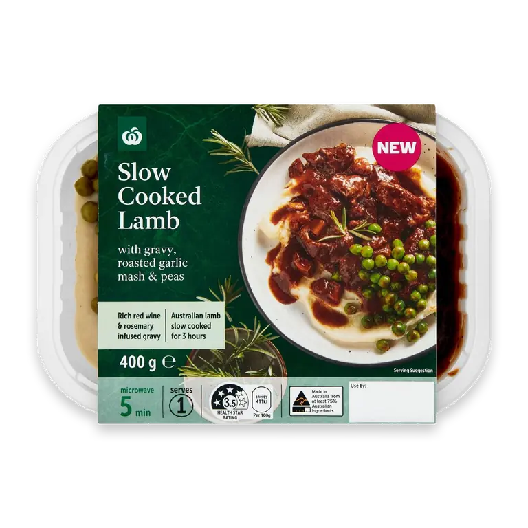 Slow Cooked Lamb With Gravy Roasted Garlic Mash & Peas